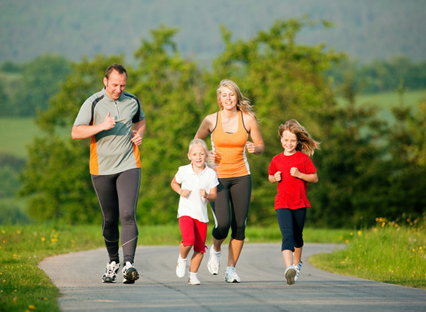 family jogging for health and fitness